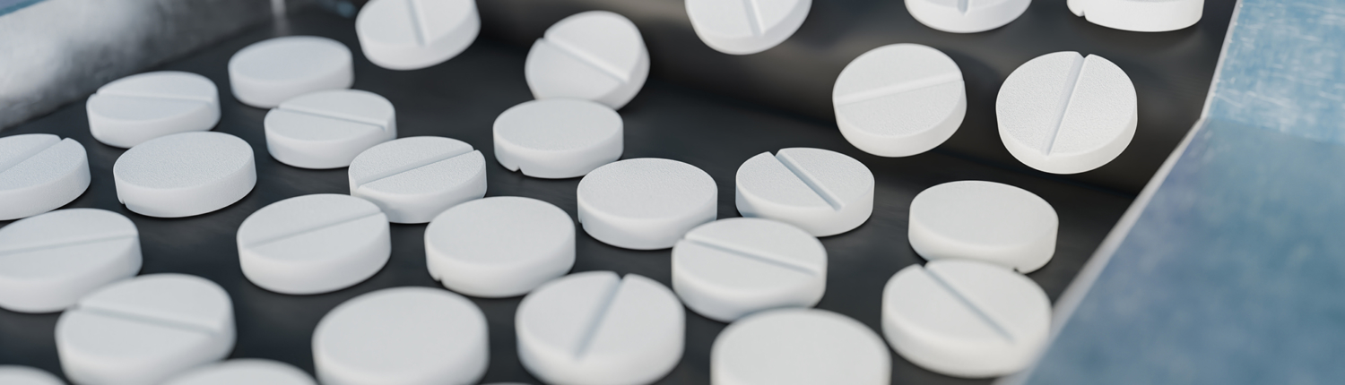 January Blog 2 Image View of uncoated tablets on a conveyor belt