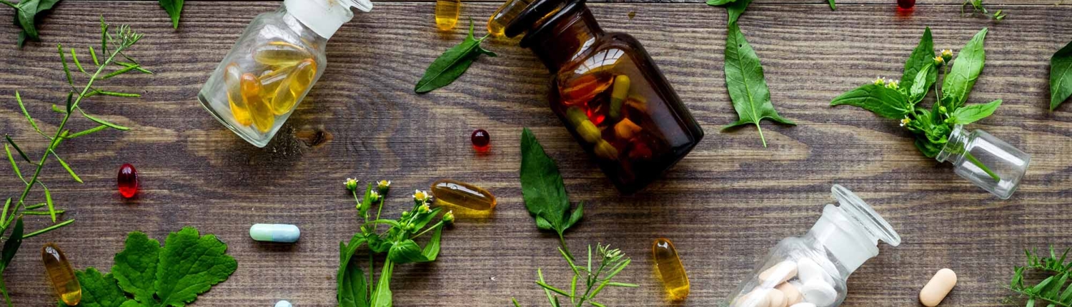Herbal medicine Leaves, bottles and pills
