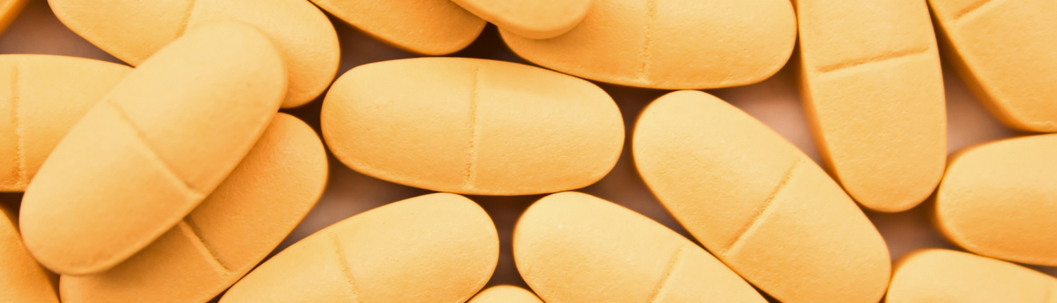 January Blog 1 Image View of orange-coated tablets